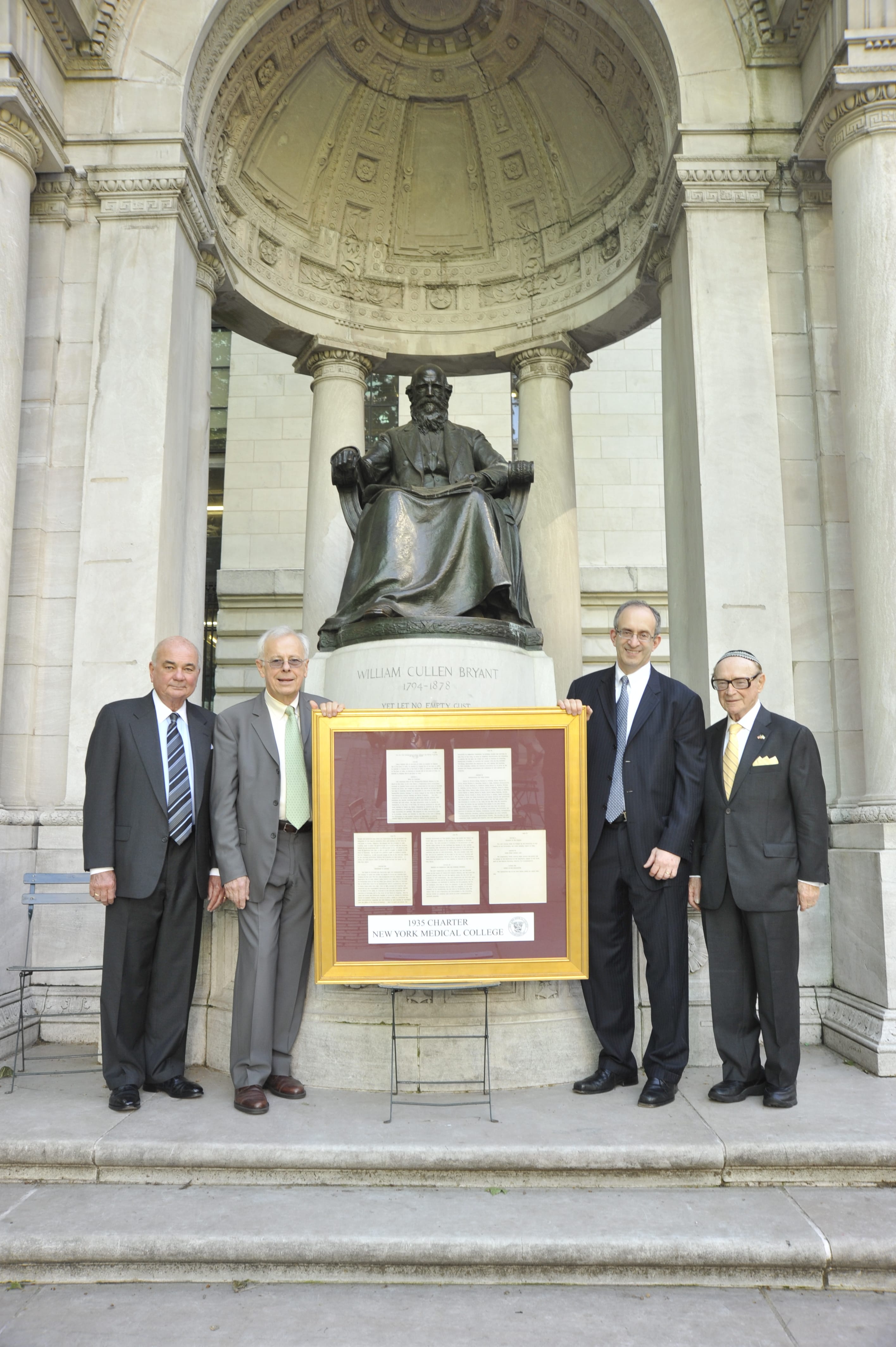 senior members of Touro and NYMC posing with the NYMC 1935 charter