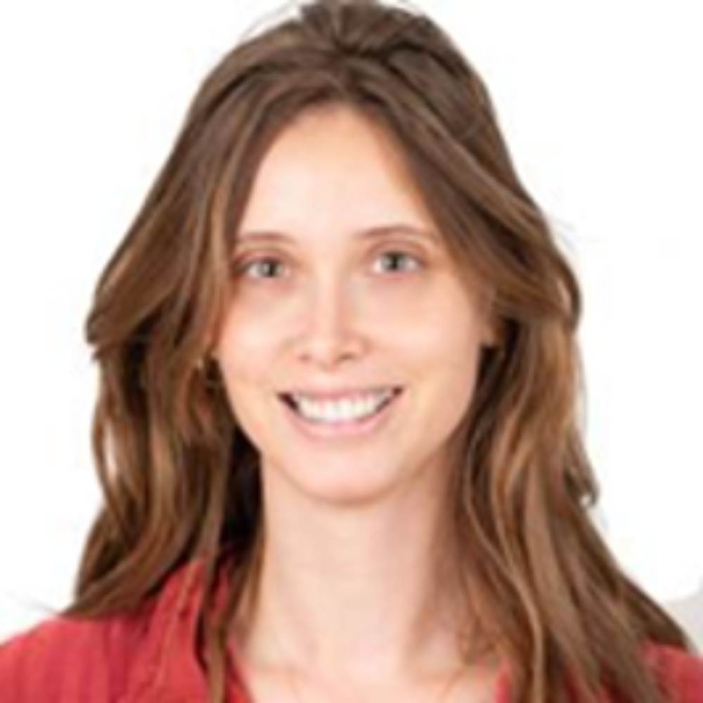 woman with long brown hair wearing red top