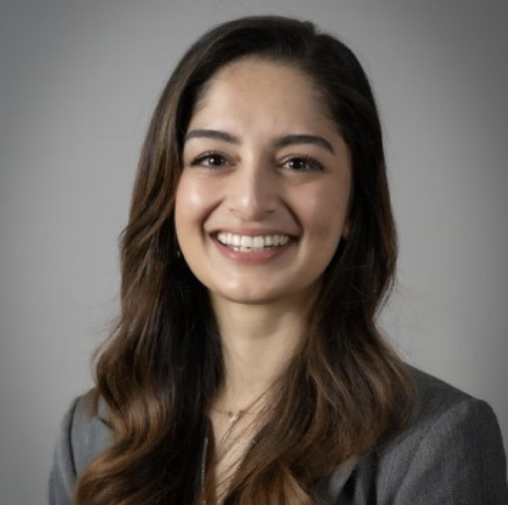 Headshot of Natasha Sukerkar smiling.