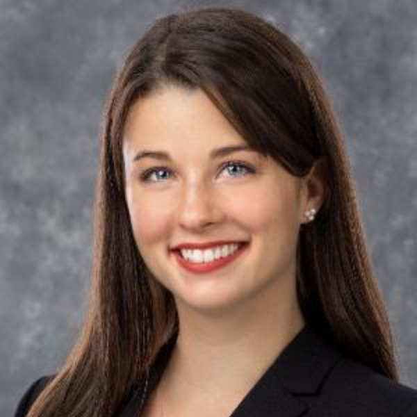 Headshot of Alina Zufall smiling.