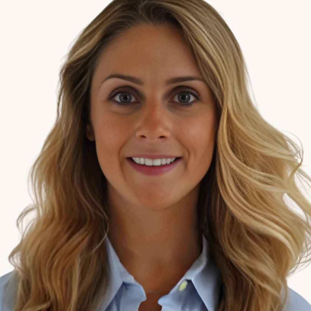 blond woman with long hair wearing blue shirt in front of white background