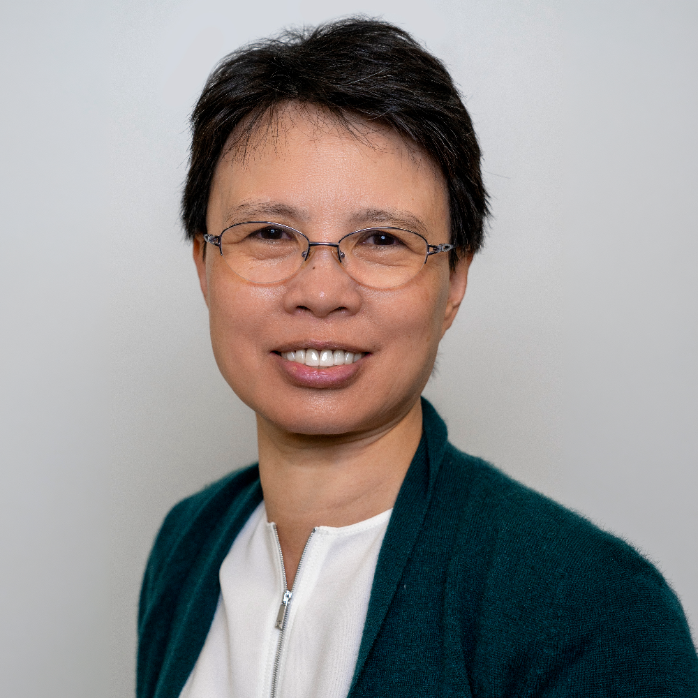 headshot of Xin Quan