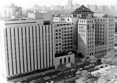 The Cohen Research Building. It is of a minimal postmodern style and looks particularly austere next to the older college building adjoining it.