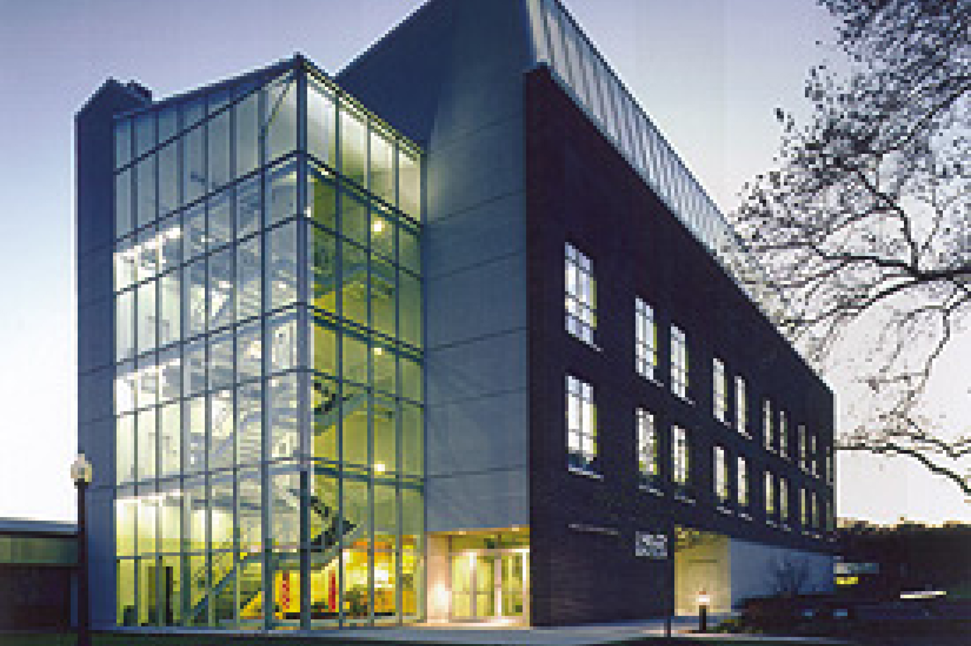 The four-story Medical Education Center with a modern exterior and glass windows around the staircase