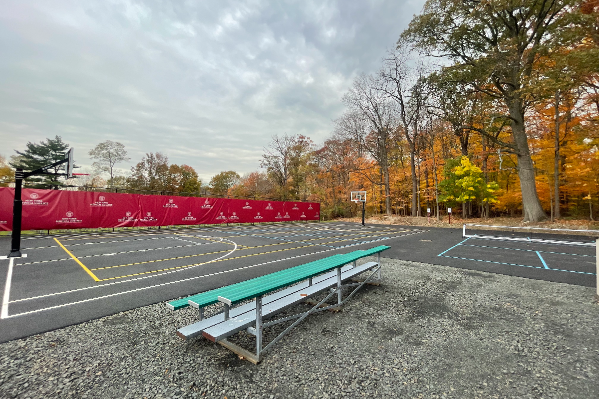 Dana Road athletic courts with fall foliage in background